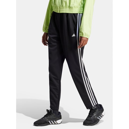 adidas Spodnie dresowe Train Essentials HZ5646 Czarny Loose Fit ze sklepu MODIVO w kategorii Spodnie damskie - zdjęcie 183813131