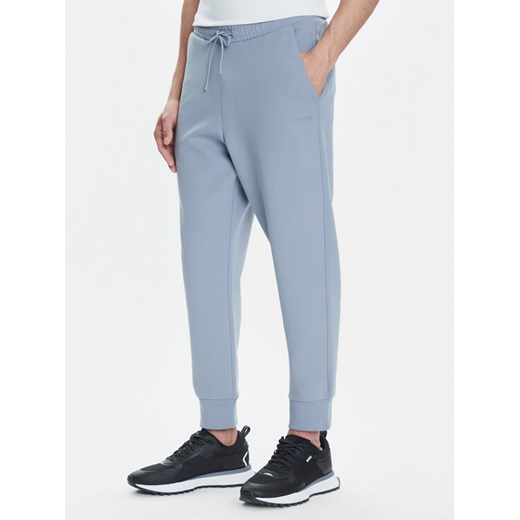 BOSS Spodnie dresowe Hadiko 50506141 Szary Regular Fit ze sklepu MODIVO w kategorii Spodnie męskie - zdjęcie 183813672
