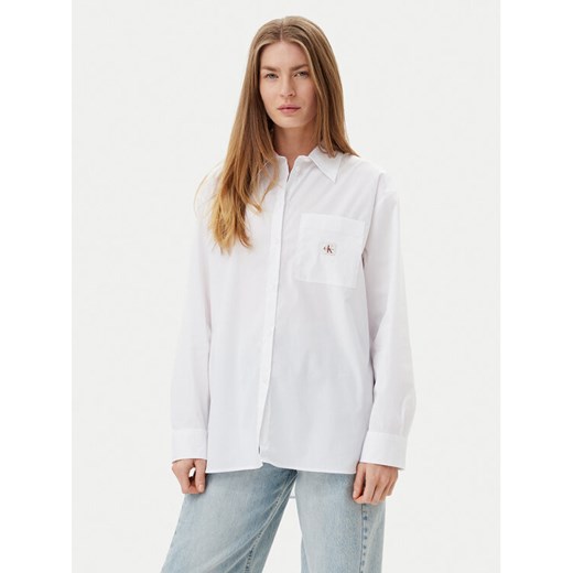 Calvin Klein Jeans Koszula LV047C143G Biały Relaxed Fit ze sklepu MODIVO w kategorii Koszule damskie - zdjęcie 183814902