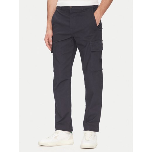 BOSS Spodnie materiałowe 50536882 Granatowy Regular Fit ze sklepu MODIVO w kategorii Spodnie męskie - zdjęcie 183815034