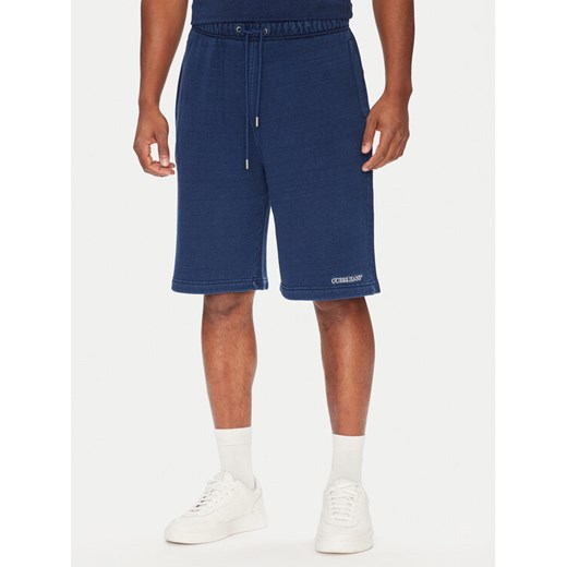 Guess Jeans Szorty sportowe M5YD49 KCXQ1 Niebieski Regular Fit ze sklepu MODIVO w kategorii Spodenki męskie - zdjęcie 183862582