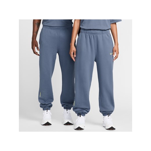 Spodnie dresowe NOCTA Fleece CS - Niebieski ze sklepu Nike poland w kategorii Spodnie męskie - zdjęcie 183881543