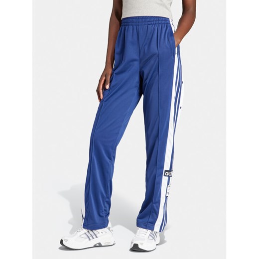 adidas Spodnie dresowe Adibreak IP0619 Granatowy Regular Fit ze sklepu MODIVO w kategorii Spodnie damskie - zdjęcie 183885670