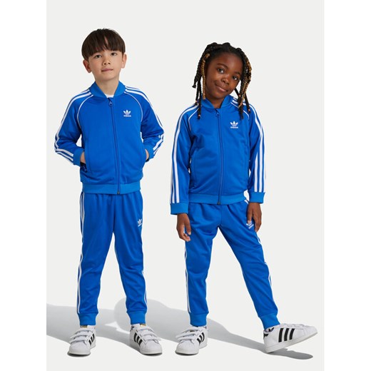 adidas Dres adicolor SST IY4008 Niebieski Regular Fit ze sklepu MODIVO w kategorii Dresy chłopięce - zdjęcie 183907504