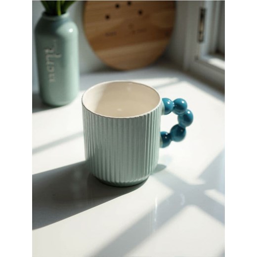 Sinsay - Kubek ceramiczny z ozdobnym uchem i ryflowaniem - błękitny ze sklepu Sinsay w kategorii Kubki - zdjęcie 183916390