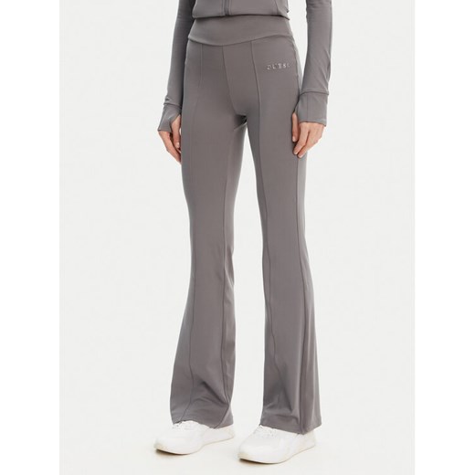 Guess Spodnie dresowe V5RB15 KCD02 Szary Regular Fit ze sklepu MODIVO w kategorii Spodnie damskie - zdjęcie 183932160