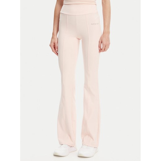 Guess Spodnie dresowe V5RB15 KCD02 Różowy Regular Fit ze sklepu MODIVO w kategorii Spodnie damskie - zdjęcie 183937970
