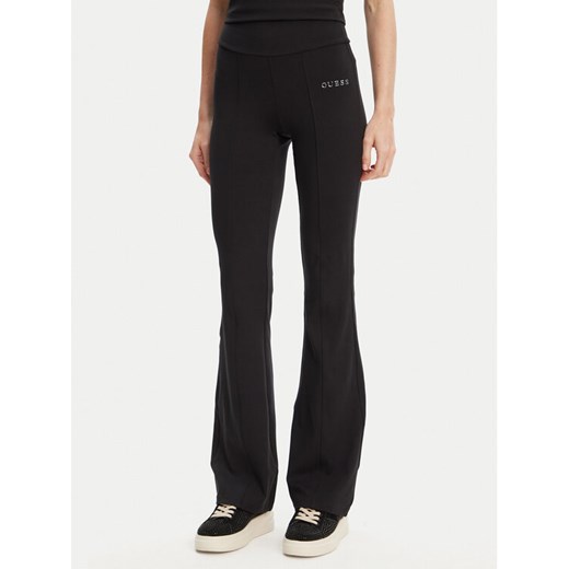 Guess Spodnie dresowe V5RB15 KCD02 Czarny Regular Fit ze sklepu MODIVO w kategorii Spodnie damskie - zdjęcie 183938150