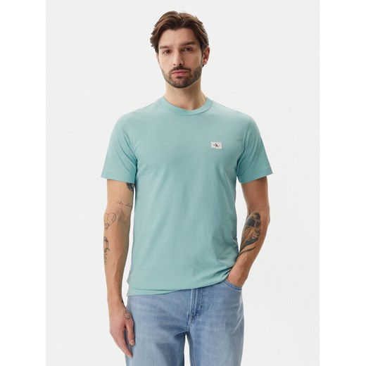 Calvin Klein Jeans T-Shirt J30J327100 Błękitny Regular Fit ze sklepu MODIVO w kategorii T-shirty męskie - zdjęcie 183938173
