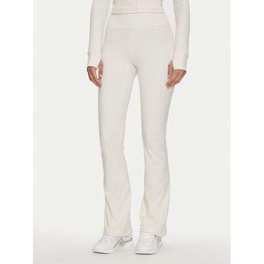 Guess Spodnie materiałowe Marika V4YB15 KCD02 Beżowy Regular Fit ze sklepu MODIVO w kategorii Spodnie damskie - zdjęcie 183944782
