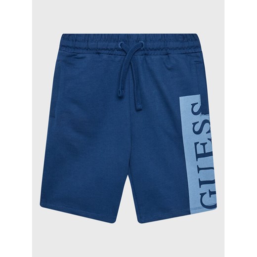 Guess Szorty sportowe L3GD03 KA6R0 Niebieski Relaxed Fit ze sklepu MODIVO w kategorii Spodenki chłopięce - zdjęcie 183944974