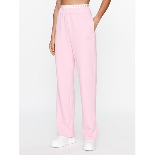 Ellesse Spodnie dresowe Vernetti SGT19237 Różowy Relaxed Fit ze sklepu MODIVO w kategorii Spodnie damskie - zdjęcie 183945674