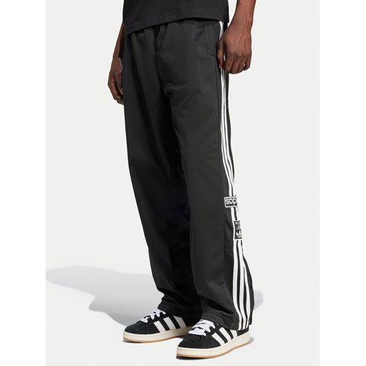 adidas Spodnie dresowe Adibreak IW3482 Czarny Loose Fit ze sklepu MODIVO w kategorii Spodnie męskie - zdjęcie 183945752