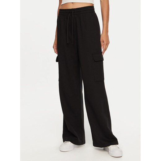 Vans Spodnie dresowe Frontside VN000HGP Czarny Loose Fit ze sklepu MODIVO w kategorii Spodnie damskie - zdjęcie 183946283