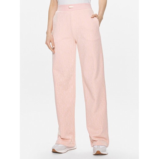Guess Spodnie dresowe Logo V4RB13 KC2W0 Różowy Relaxed Fit ze sklepu MODIVO w kategorii Spodnie damskie - zdjęcie 183946852