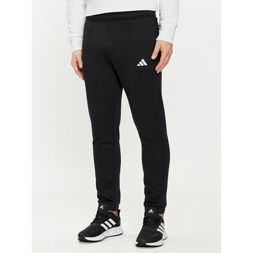 adidas Spodnie dresowe Pump Workout IT4310 Czarny Regular Fit ze sklepu MODIVO w kategorii Spodnie męskie - zdjęcie 183946952