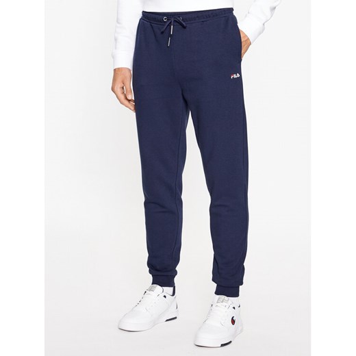 Fila Spodnie dresowe FAM0500 Granatowy Regular Fit ze sklepu MODIVO w kategorii Spodnie męskie - zdjęcie 183947071