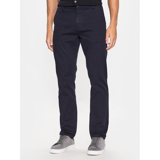 Guess Chinosy M3YB16 WFIN3 Niebieski Slim Fit ze sklepu MODIVO w kategorii Spodnie męskie - zdjęcie 183947182
