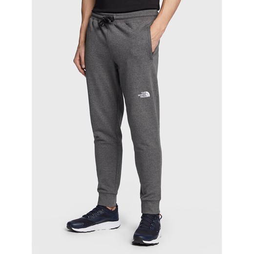 The North Face Spodnie dresowe Nse Light NF0A4T1F Szary Regular Fit ze sklepu MODIVO w kategorii Spodnie męskie - zdjęcie 183947243