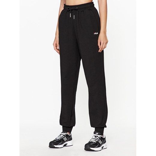 Fila Spodnie dresowe FAW0559 Czarny Relaxed Fit ze sklepu MODIVO w kategorii Spodnie damskie - zdjęcie 183947760