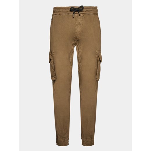 Alpha Industries Joggery Twill 116202 Beżowy Regular Fit ze sklepu MODIVO w kategorii Spodnie męskie - zdjęcie 183947912