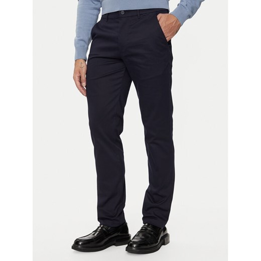 Calvin Klein Chinosy K10K113429 Granatowy Slim Fit ze sklepu MODIVO w kategorii Spodnie męskie - zdjęcie 183948364