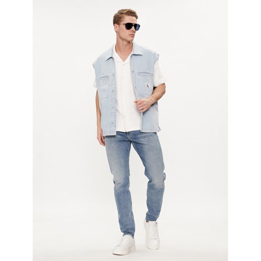 Calvin Klein Jeans Kamizelka J30J325309 Niebieski Regular Fit ze sklepu MODIVO w kategorii Kamizelki męskie - zdjęcie 183985211