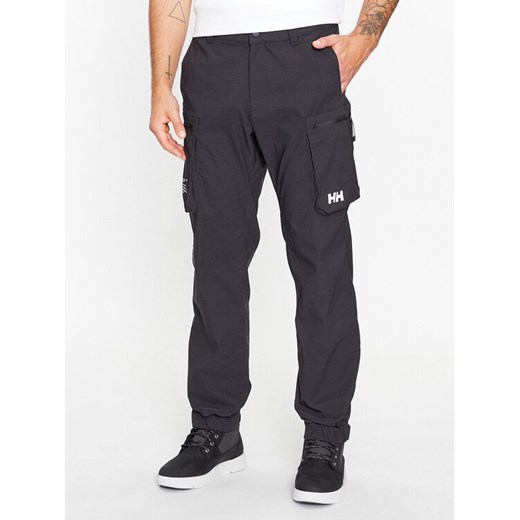 Helly Hansen Spodnie materiałowe Move 53978 Czarny Regular Fit ze sklepu MODIVO w kategorii Spodnie męskie - zdjęcie 183985694