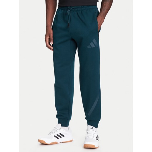adidas Spodnie dresowe Z.N.E. JW4724 Zielony Loose Fit ze sklepu MODIVO w kategorii Spodnie męskie - zdjęcie 184026692