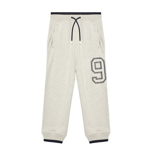 United Colors Of Benetton Spodnie dresowe 3BC1CF065 Szary Relaxed Fit ze sklepu MODIVO w kategorii Spodnie chłopięce - zdjęcie 184045593