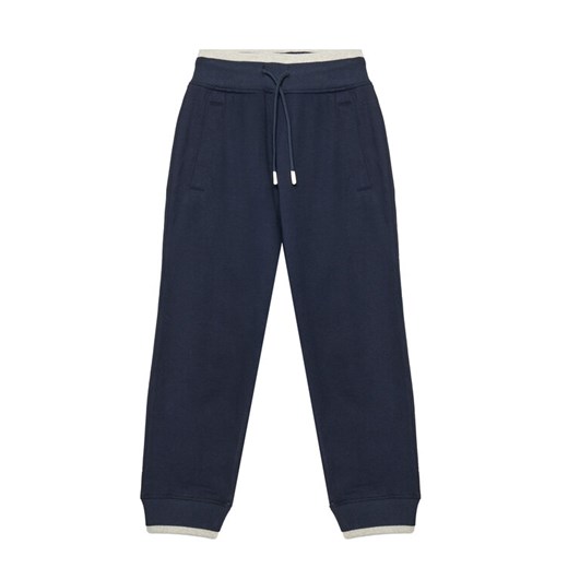 United Colors Of Benetton Spodnie dresowe 3BC1CF065 Granatowy Relaxed Fit ze sklepu MODIVO w kategorii Spodnie chłopięce - zdjęcie 184045743