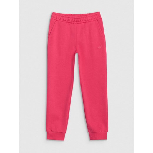 Dziewczęce spodnie dresowe joggery 4F 4FJWSS25TTROF1099 - różowe ze sklepu Sportstylestory.com w kategorii Spodnie dziewczęce - zdjęcie 184054813