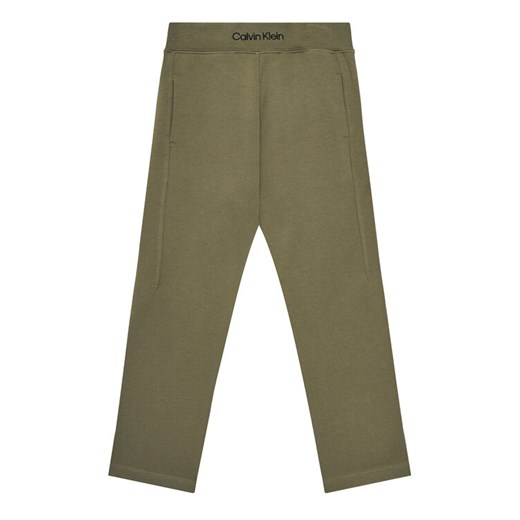Calvin Klein Jeans Spodnie dresowe IB0IB02538 D Zielony Regular Fit ze sklepu MODIVO w kategorii Spodnie chłopięce - zdjęcie 184058163
