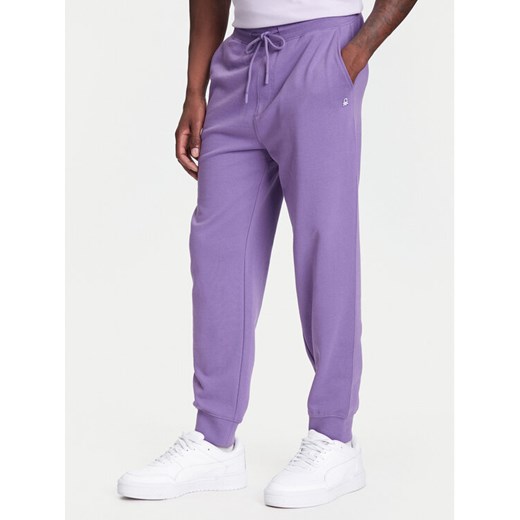United Colors Of Benetton Spodnie dresowe 342ZUF01B Fioletowy Regular Fit ze sklepu MODIVO w kategorii Spodnie męskie - zdjęcie 184098220