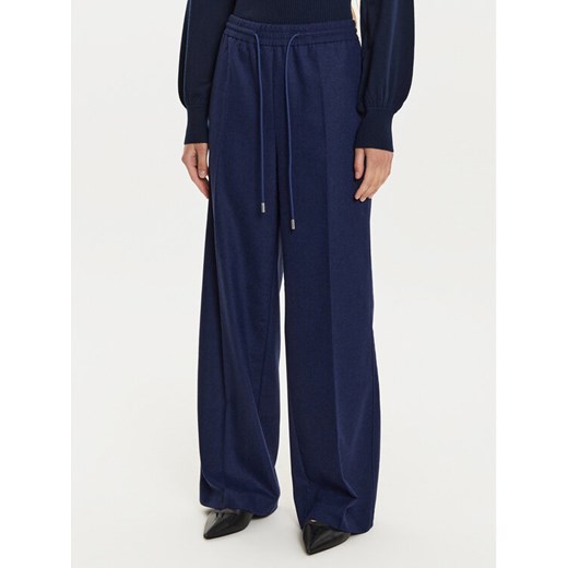 BOSS Spodnie dresowe Tavite1 50528604 Granatowy Relaxed Fit ze sklepu MODIVO w kategorii Spodnie damskie - zdjęcie 184098253