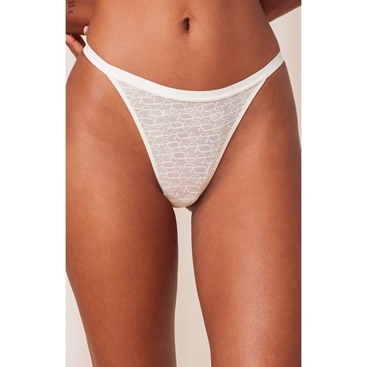 Triumph stringi kremowe Signature Sheer String 10216494, Kolor kremowy, Rozmiar 42, Triumph ze sklepu Intymna w kategorii Majtki damskie - zdjęcie 184151930