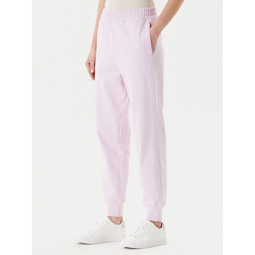 United Colors Of Benetton Spodnie dresowe 3UNIDF01A Różowy Regular Fit ze sklepu MODIVO w kategorii Spodnie damskie - zdjęcie 184158663