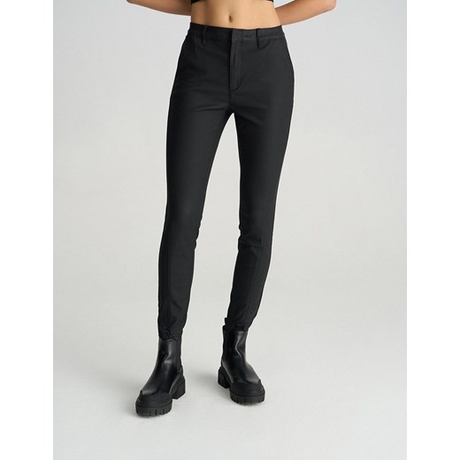Woskowane spodnie skinny fit ze sklepu Diverse w kategorii Spodnie damskie - zdjęcie 184174141
