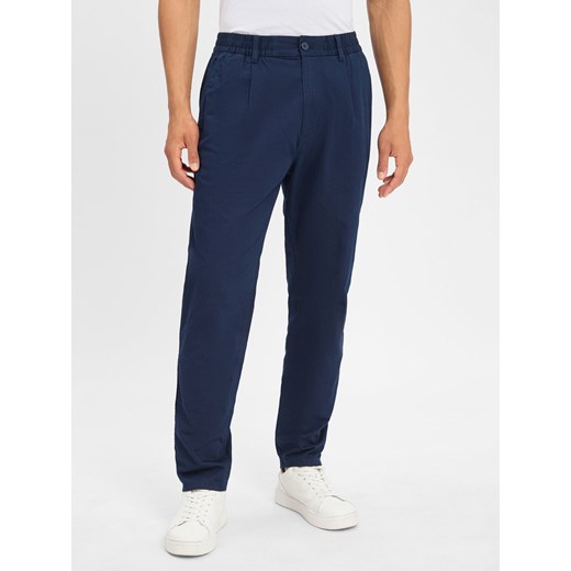Tommy Jeans Chino - Isaac Mężczyźni Bawełna granatowy jednolity ze sklepu vangraaf w kategorii Spodnie męskie - zdjęcie 184182304
