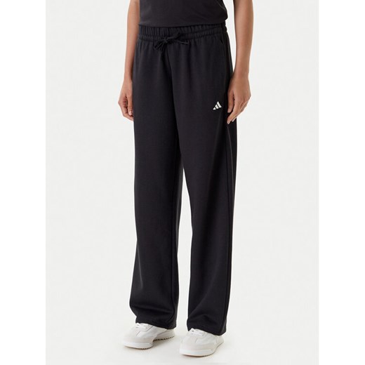 adidas Spodnie dresowe Essentials Small Logo Feel Cozy JC5921 Czarny Regular Fit ze sklepu MODIVO w kategorii Spodnie damskie - zdjęcie 184187423