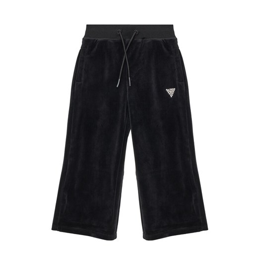 Guess Spodnie dresowe J4RQ16 K0232 Czarny Regular Fit ze sklepu MODIVO w kategorii Spodnie chłopięce - zdjęcie 184199603