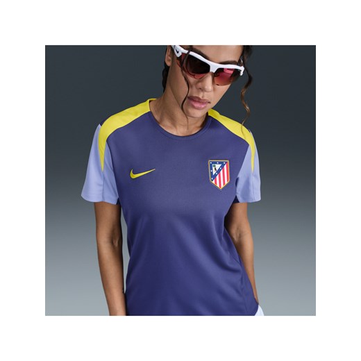 Damska koszulka piłkarska z krótkim rękawem Nike Dri-FIT Atlético Madryt Strike - Fiolet ze sklepu Nike poland w kategorii Bluzki damskie - zdjęcie 184204031