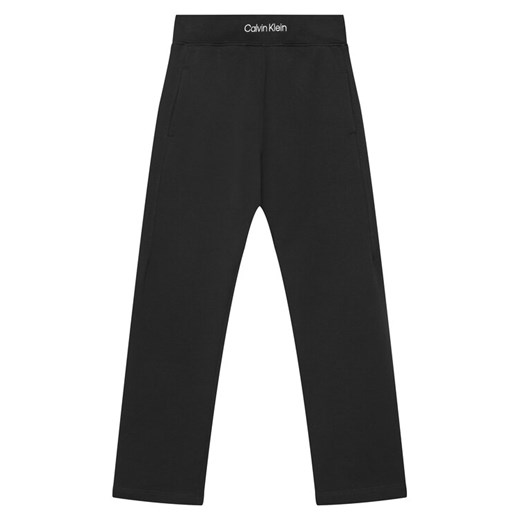Calvin Klein Jeans Spodnie dresowe IB0IB02538 D Czarny Regular Fit ze sklepu MODIVO w kategorii Spodnie chłopięce - zdjęcie 184231822