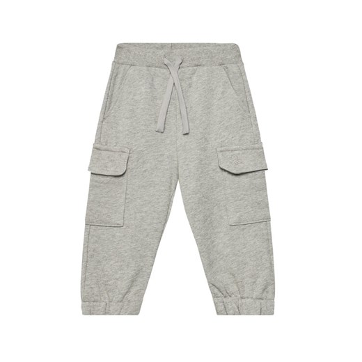 United Colors Of Benetton Spodnie dresowe 3UNIGF045 Szary Regular Fit ze sklepu MODIVO w kategorii Spodnie chłopięce - zdjęcie 184231830
