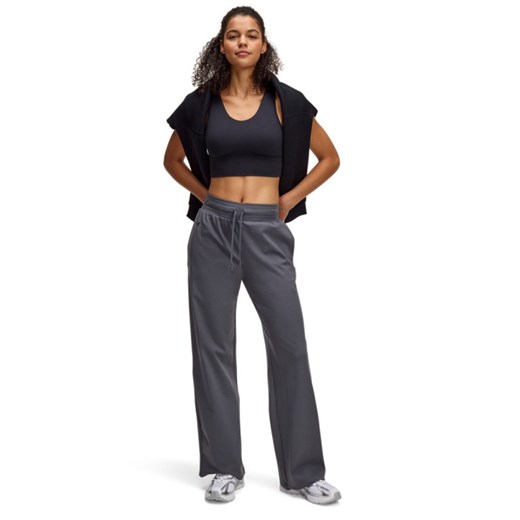 Damskie spodnie treningowe Under Armour Motion Open Hem Pant - szare ze sklepu Sportstylestory.com w kategorii Spodnie damskie - zdjęcie 184236904