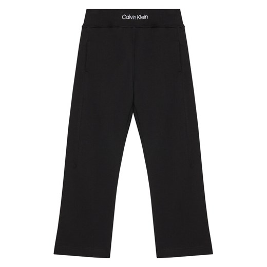 Calvin Klein Jeans Spodnie dresowe IB0IB02538 M Czarny Regular Fit ze sklepu MODIVO w kategorii Spodnie chłopięce - zdjęcie 184253322