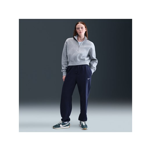 Damskie spodnie dresowe o kroju oversize z wysokim stanem Nike Sportswear Phoenix Fleece - Niebieski ze sklepu Nike poland w kategorii Spodnie damskie - zdjęcie 184264580