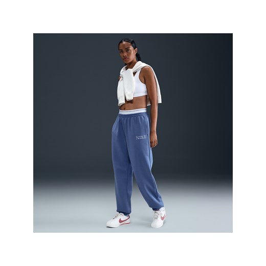 Damskie spodnie dresowe z wysokim stanem Nike Sportswear Phoenix Fleece - Niebieski ze sklepu Nike poland w kategorii Spodnie damskie - zdjęcie 184284311
