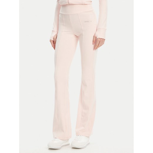 Guess Spodnie dresowe V5RB15 KCD02 Różowy Regular Fit ze sklepu MODIVO w kategorii Spodnie damskie - zdjęcie 184290510