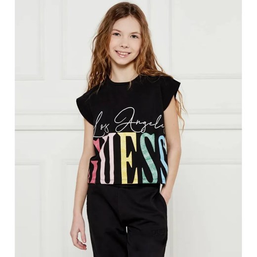 Guess T-shirt | Regular Fit ze sklepu Gomez Fashion Store w kategorii Bluzki dziewczęce - zdjęcie 184297663